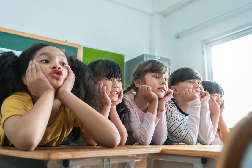 Portrait of Cheerful Multi-ethnic school kids in classroom, Smiling Faces